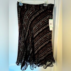 Jones New York layered silk skirt with side zipper and button closure.